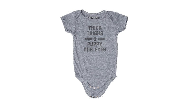 Thick Thighs and Puppy Dog Eyes Onesie